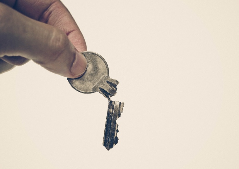 A broken front door key that snapped in a doors lock.