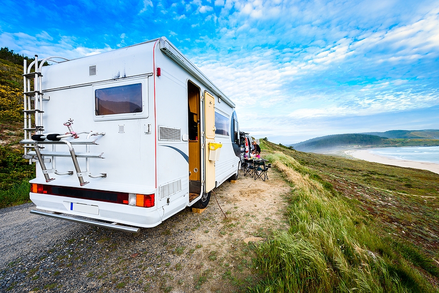 Motorhome parked by lake