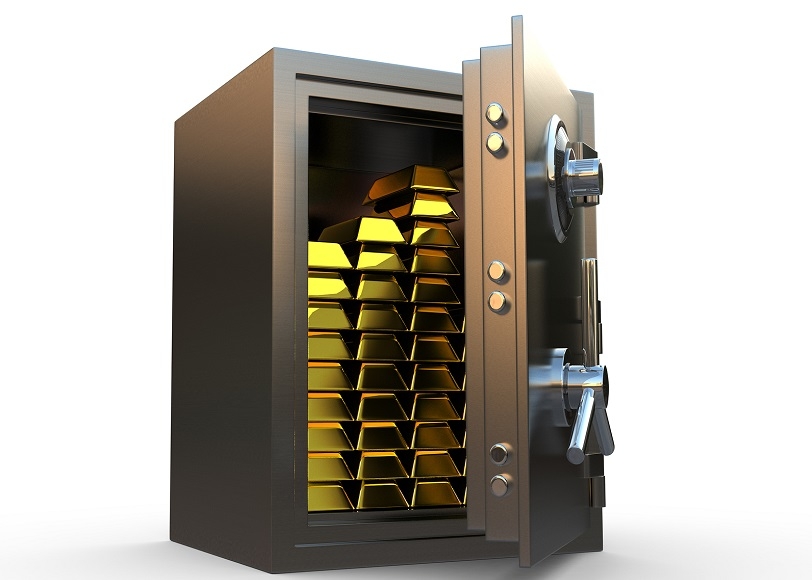 Gold bars inside of a safe. 